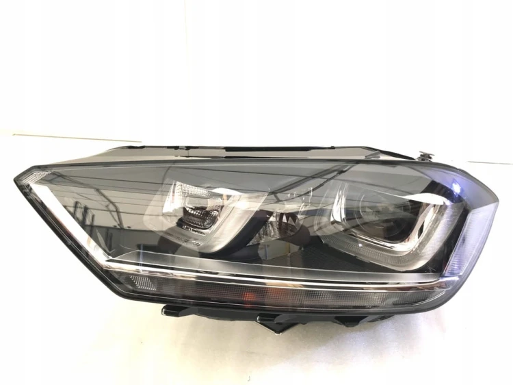 VW GOLF VII SPORTSVAN BIXENON LED LAMPA LEWY 517