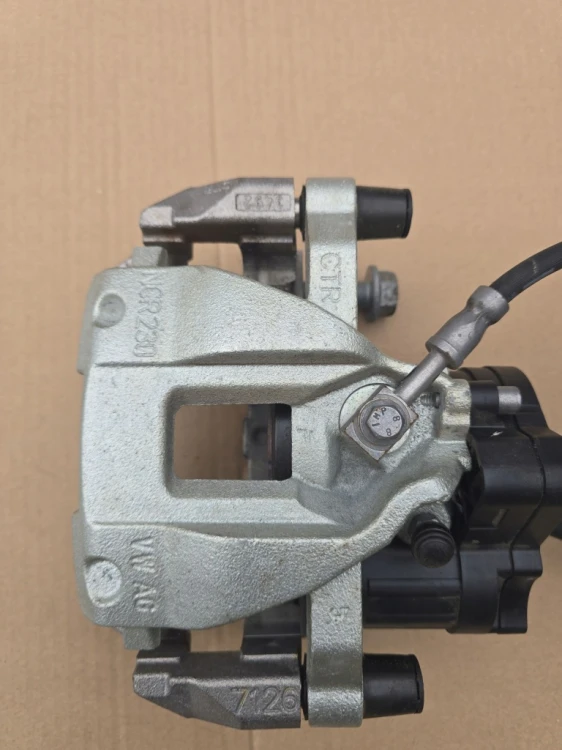 7T0615406E 7T0927902P ZACISK HAMULCOWY TYLNY PRAWY OEM VW T7 MULTIVAN