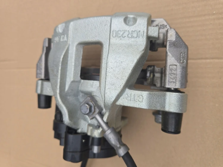7T0615406E 7T0927902P ZACISK HAMULCOWY TYLNY PRAWY OEM VW T7 MULTIVAN
