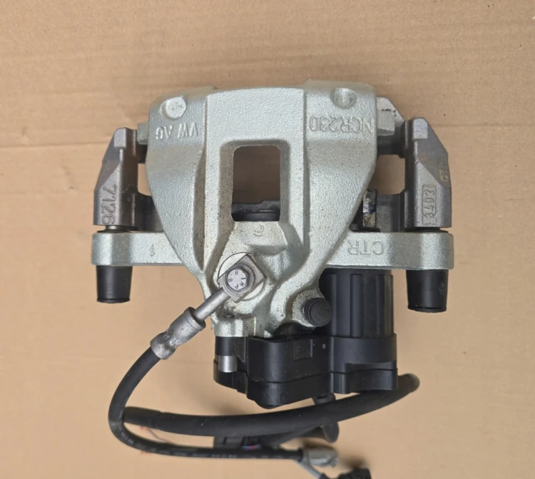 7T0615405E 7T0927902M ZACISK HAMULCOWY TYLNY LEWY OEM VW T7 MULTIVAN