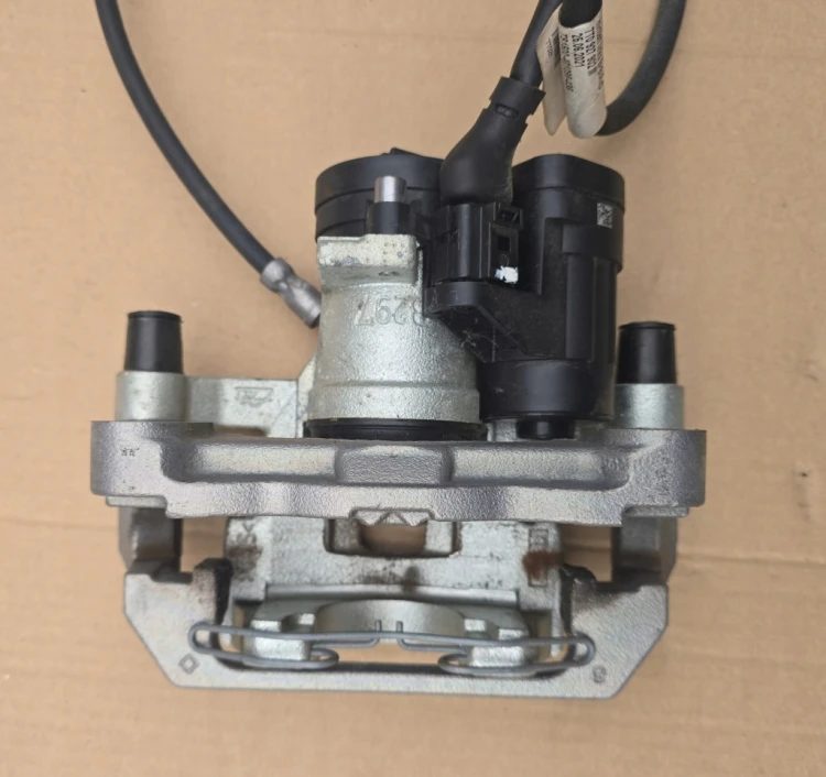 7T0615405E 7T0927902M ZACISK HAMULCOWY TYLNY LEWY OEM VW T7 MULTIVAN