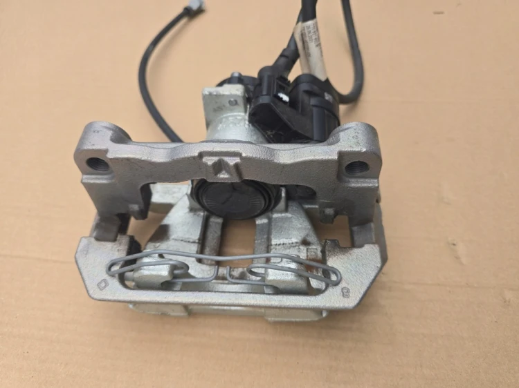 7T0615405E 7T0927902M ZACISK HAMULCOWY TYLNY LEWY OEM VW T7 MULTIVAN