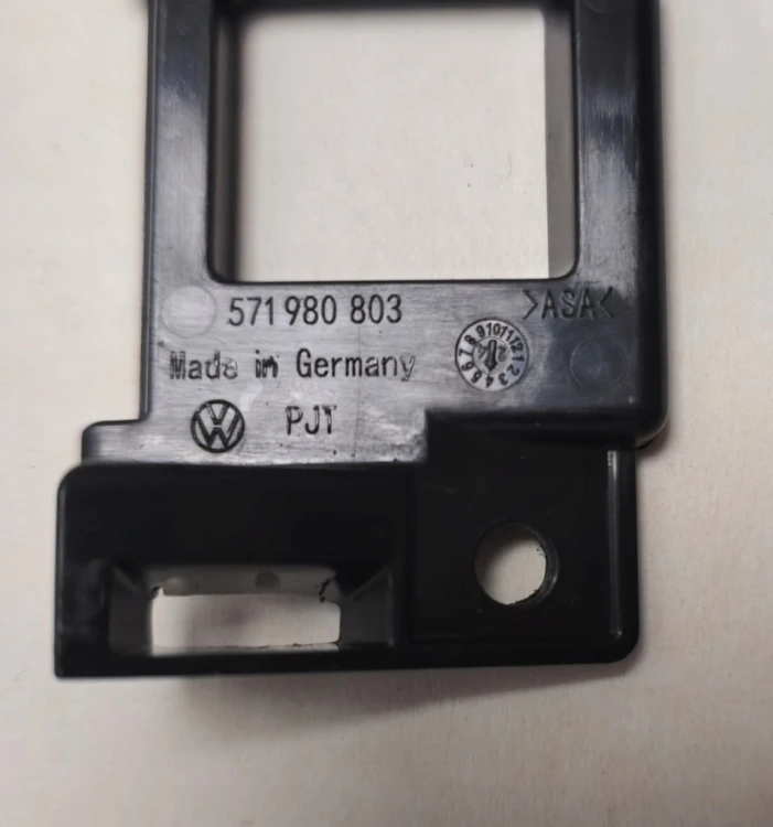 VW TIGUAN III UCHWYT KAMERY OBUDOWA PRZÓD GRILL 571853140 CZARNY MAT