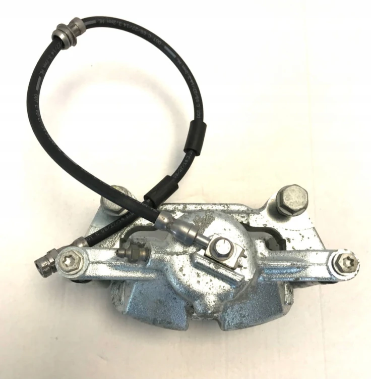 VW AUDI SEAT SKODA ZACISK HAMULCOWY PRAWY TRW 6792/G