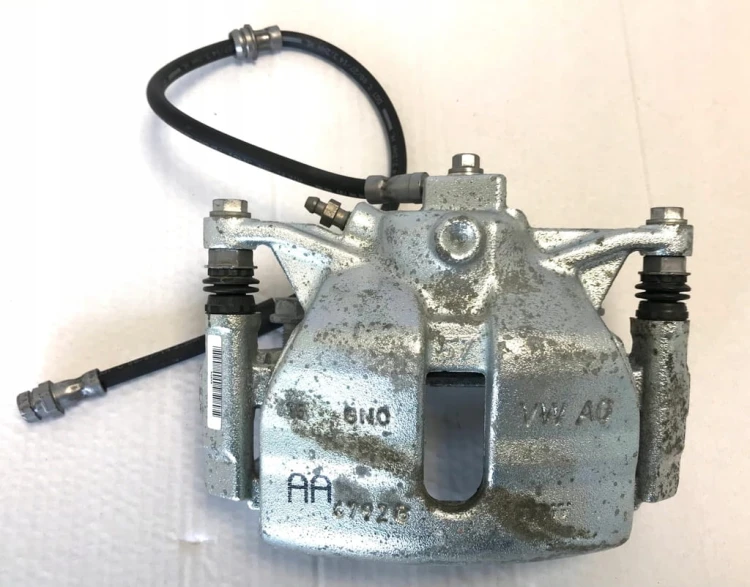 VW AUDI SEAT SKODA ZACISK HAMULCOWY PRAWY TRW 6792/G