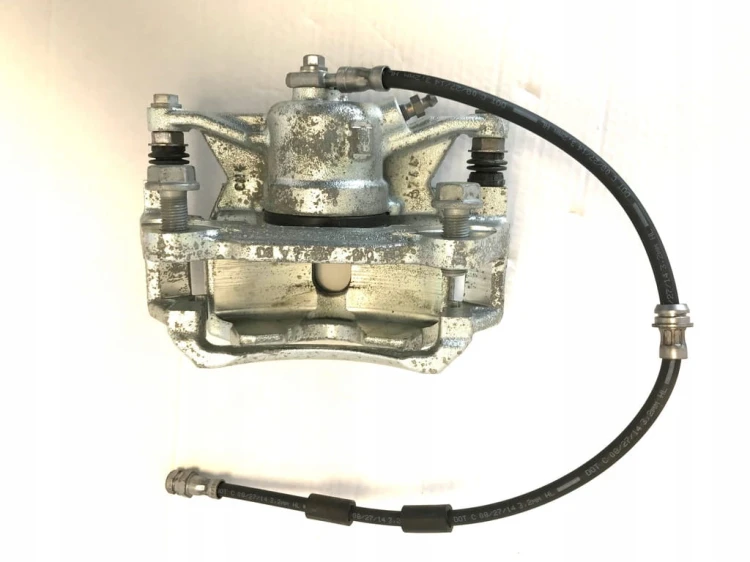 VW AUDI SEAT SKODA ZACISK HAMULCOWY PRAWY TRW 6792/G