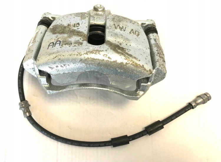 VW AUDI SEAT SKODA ZACISK HAMULCOWY PRAWY TRW 6792/G